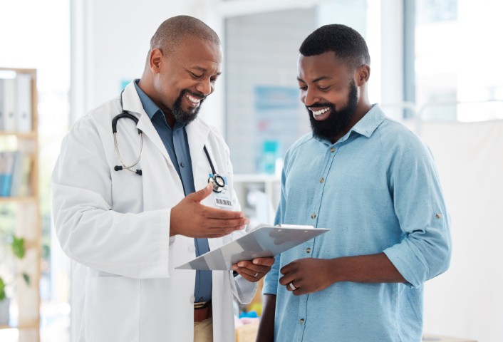 Primary care physician speaking with a patient